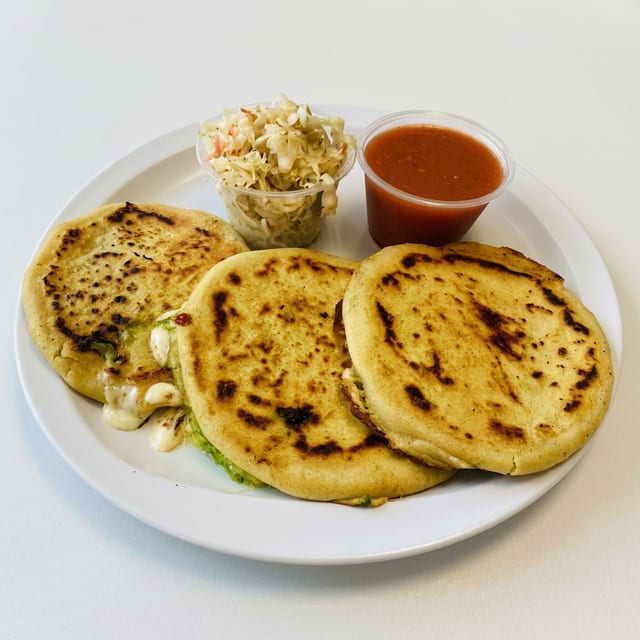 Pupusa - Seasoned Pork and Cheese.